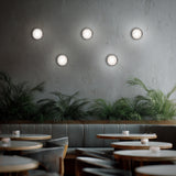 Black Balto III 4CCT LED Flush Mount by WAC Lighting in Restaurant Area