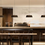 Black Halo Pendant by Seed Design in Dining Area