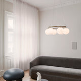 Brass/Opal 6 Lights Miira Circular Chandelier by Nuura in Living Room