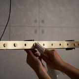 Brass Tram Linear Pendant by Seed Design Details