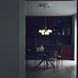 Brushed Brass/Opal 9 Lights Apiales Chandelier by Nuura in Dining Area