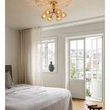 Brushed Brass/Optic Gold 6 Lights Apiales Ceiling Light by Nuura in Bedroom