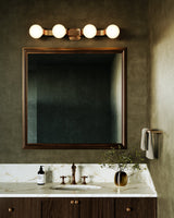 Brushed Gold Briar Vanity Light by Kuzco Lighting in Bathroom