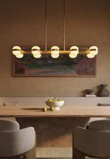 Brushed Gold Selene Linear Pendant by Kuzco Lighting in Dining Room