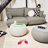 Bubble Area Rug - Vanilla Ice, under a sofa and poufs