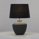 Buriti Table Lamp by Geo Contemporary in Graphite with a Black shade, lit