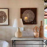 Búzios Table Lamp by Geo Contemporary on a marble console beside terracotta vessels