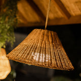 Calobra Portable Pendant Light - lit under a roof, close view