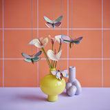 Dotted Butterfly Ornament, styled in an interior