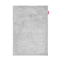 Soft grey rug with rows of raised tonal circles in a tufted dot pattern — Dot Carpet by Fatboy