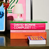 Edison La Surprise Table Lamp - on a stack of books