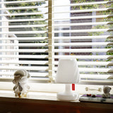 Edison The Petit Table Lamp - White, on a windowsill
