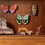 Fern Striped Butterfly Wall Art, styled in an interior