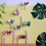 Fern Striped Butterfly Wall Art, styled in an interior