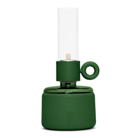 Small green oil flame lamp with glossy base, matte holder, ring handle, and clear glass chimney — Flamtastique XS by Fatboy