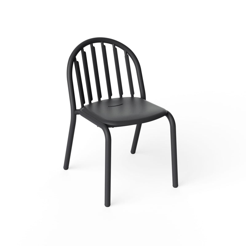 Anthracite outdoor chair with rounded spindle back and curved tubular frame on four splayed legs — Fred's Chair by Fatboy