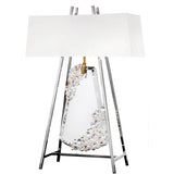 Decorative table lamp with crystal base and white shade on a white background