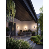 Frame Smart Cage Wall Sconce by Dals on an exterior wall