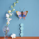 Gold Rim Butterfly Wall Art, styled in an interior