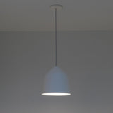 Gael Ceramic Pendant Light by Geo Contemporary in White, lit against a grey studio wall