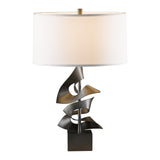 Gallery Twofold Table Lamp, shown in Dark Smoke, Natural Anna Shade, by Hubbardton Forge