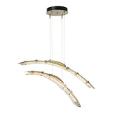 Glissade Double LED Pendant, shown in Modern Brass, by Hubbardton Forge