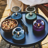 Glow 08 Candle Holder - on an outdoor tray table