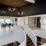 Champagne Gold Konnect Chandelier P10 by Seed Design in Living Room
