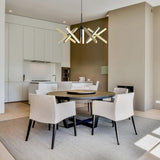 Champagne Gold Konnect Chandelier P10 by Seed Design in Dining Room