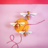 Honey Bees Wall Art, Set of 3, styled in an interior