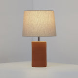 Jatobá Table Lamp by Geo Contemporary in Terracotta with a Rustic Linen shade, lit