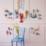 Lavender Lobster Wall Art, styled in an interior
