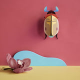 Lemon Fruit Beetle Wall Art, styled in an interior