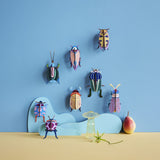 Lemon Fruit Beetle Wall Art, styled in an interior