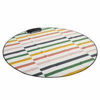 Round outdoor rug with offset multicolour stripes in coral, mustard, green and grey on cream with black trim — Love Rug by Basil Bangs