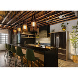 Lex Pendant Lights by Cerno hanging over a kitchen bar with stools