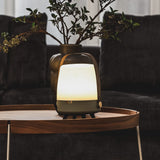 Lite-Up Play Mini JBL Battery Table Lamp - Petroleum, lit on a side table