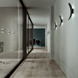 Matte Black Vela Wall Sconce by Penta in Corridor Area