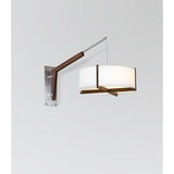Motus Swing Arm Bracket by Cerno in brushed aluminum with walnut body, shown with a Plura 18 pendant (sold separately)