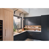 Motus Swing Arm Bracket by Cerno pair with Calx pendants above a kitchen window