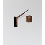 Motus Swing Arm Bracket by Cerno in textured black with walnut body, shown with a Claudo pendant (sold separately)