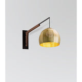 Motus Swing Arm Bracket by Cerno in textured black with walnut body, shown with an Amicus 12 pendant (sold separately)