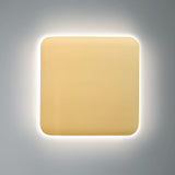 Muted Yellow Ceramic Small Square Backlit ADA Color Selectable Wall Sconce by Justice Design
