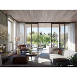 Nauta Floor Lamp by Cerno beside a sofa in a resort living room
