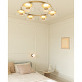 Nordic Gold/Clear 6 Light Blossi Chandelier by Nuura in Bedroom