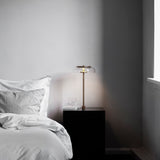 Nordic Gold/Clear Large Blossi In-set Table Lamp by Nuura in Bedroom