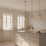 Nordic Gold/Gold Anoli 3 Multi-Light Suspension by Nuura in Dining Area