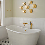 Nordic Gold/Optic Clear Liila 7 Wall/Ceiling Light by Nuura in Bathroom