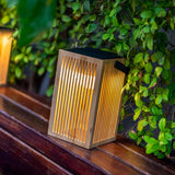 Okinawa Solar Lantern - lit on a ledge