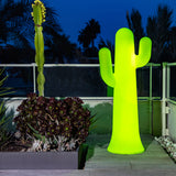 Pancho Floor Lamp - Lime With Cable, on a terrace at dusk